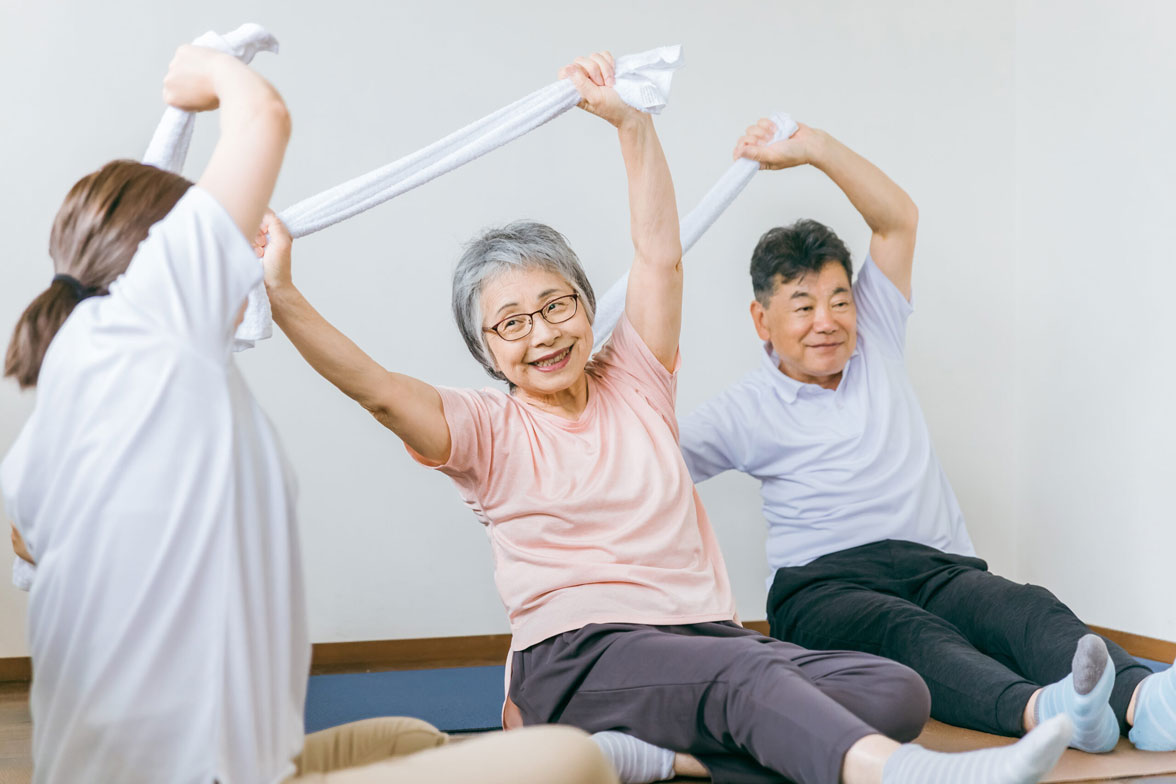 Elderly Working Out in Hospice Group Class