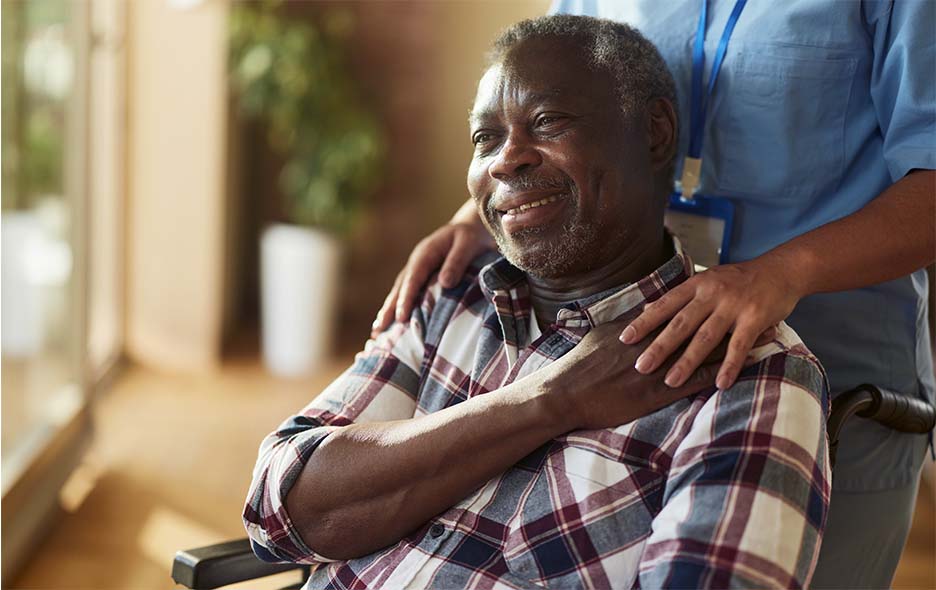 ADL Caregiver helping a patient 