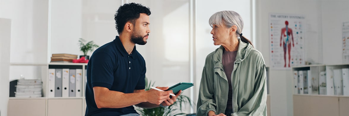 Practitioner meeting with a senior patient