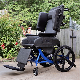 Blue and black wheelchair parked outdoors on a patio