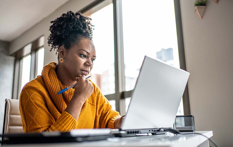 Business owner working on a laptop